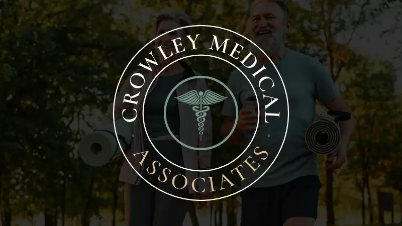 Logo with background image of elderly couple jogging for Crowley Medical Associates