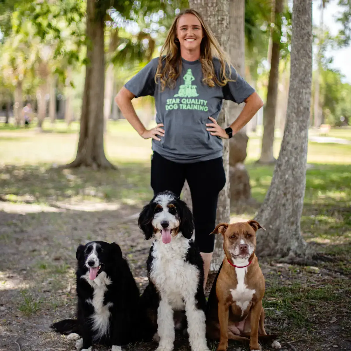 Sarah Ross and three dogs